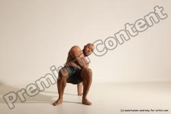 Underwear Gymnastic poses Man Black Muscular Bald Dancing Dynamic poses Academic